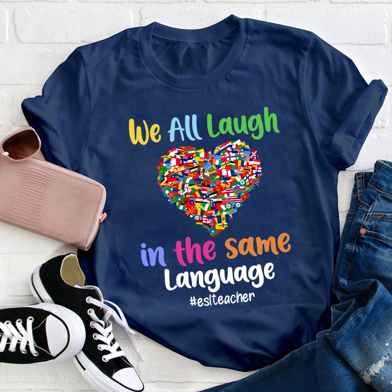 We All Laugh In The Same Language Teacher T-Shirt