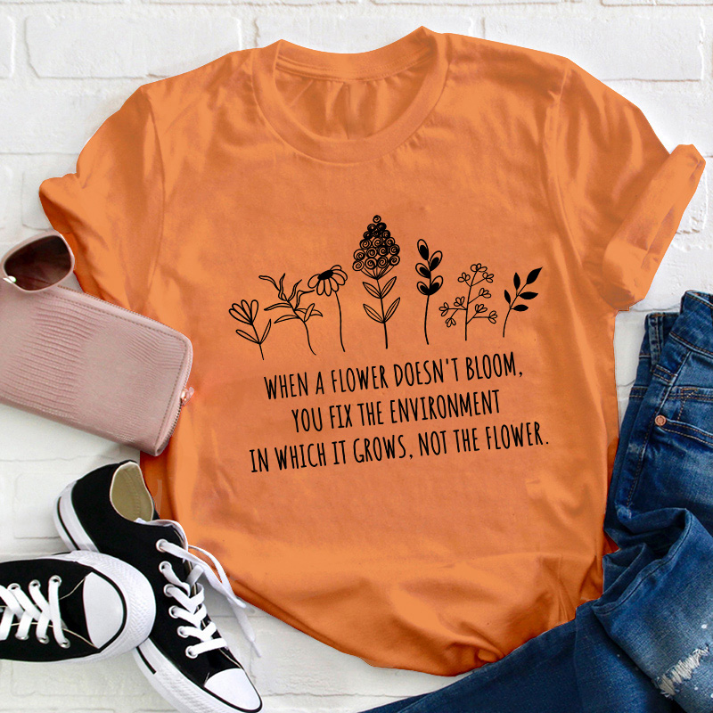 When A Flower Doesn't Bloom Teacher T-Shirt