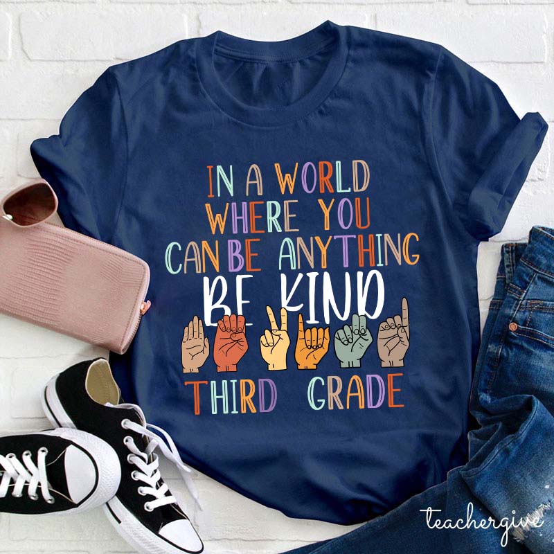 In A World Where You Can Be Anything Teacher T-Shirt