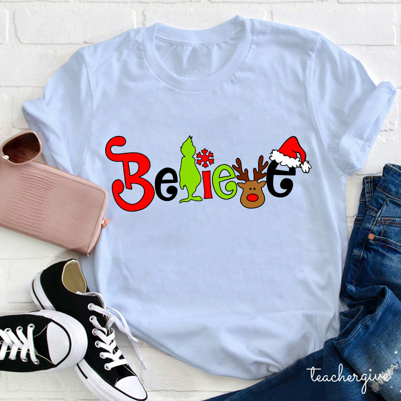 What A Merry Winter Believe Teacher T-Shirt