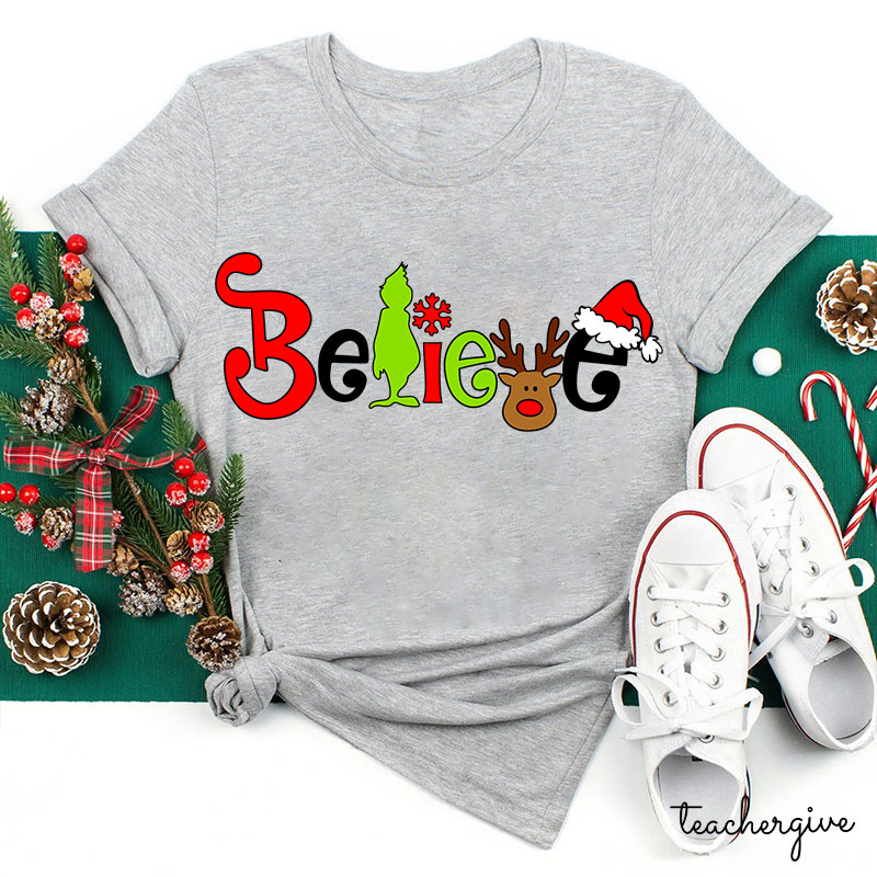 What A Merry Winter Believe Teacher T-Shirt
