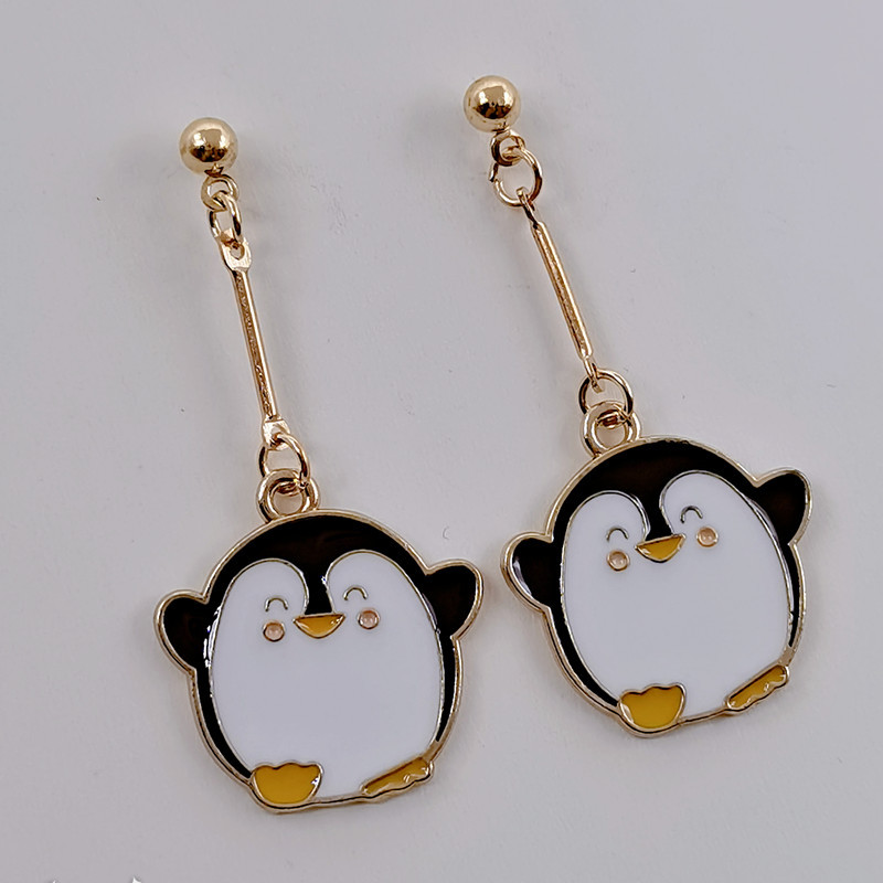 The Flying Penguin Metal Earrings