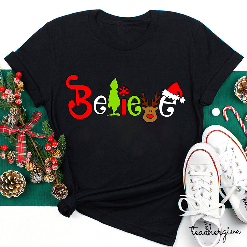What A Merry Winter Believe Teacher T-Shirt