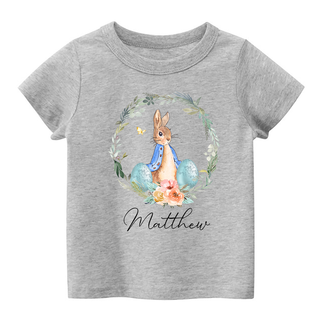 Peter Rabbit Easter Egg Floral WreathKids T-Shirt