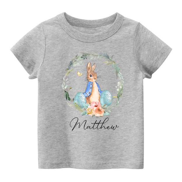 Peter Rabbit Easter Egg Floral WreathKids T-Shirt
