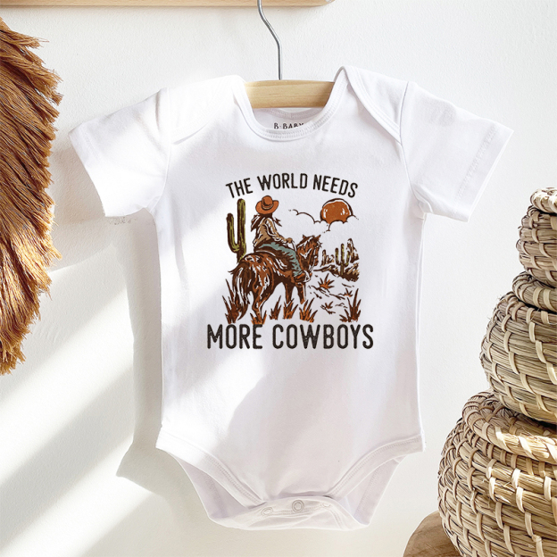 The World Needs More Cowboys Baby Bodysuit