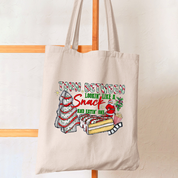 Torn Between Christmas Tote Bag