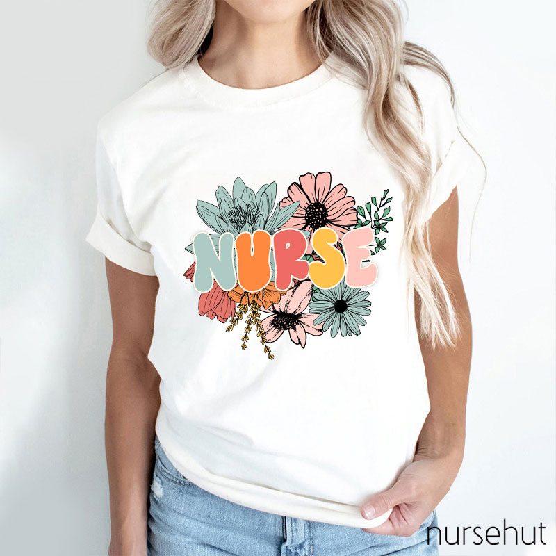 A Nurse Surrounded By Flowers Nurse T-Shirt