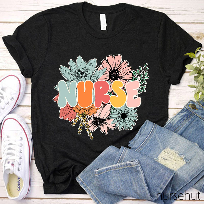 A Nurse Surrounded By Flowers Nurse T-Shirt