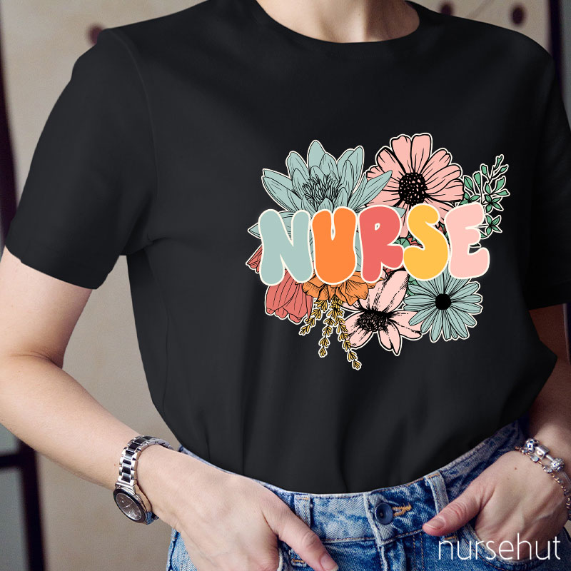 A Nurse Surrounded By Flowers Nurse T-Shirt