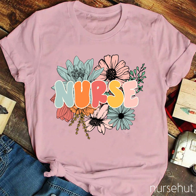 A Nurse Surrounded By Flowers Nurse T-Shirt