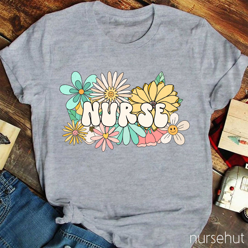 Nurse Surrounded By Flowers Nurse T-Shirt