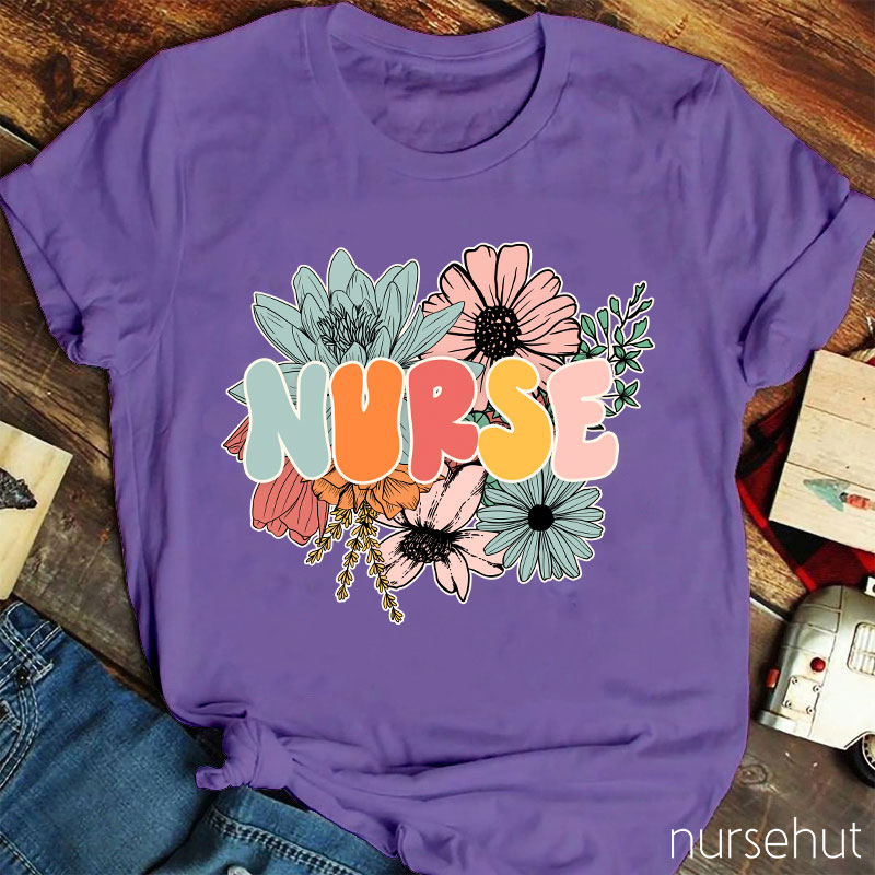 A Nurse Surrounded By Flowers Nurse T-Shirt