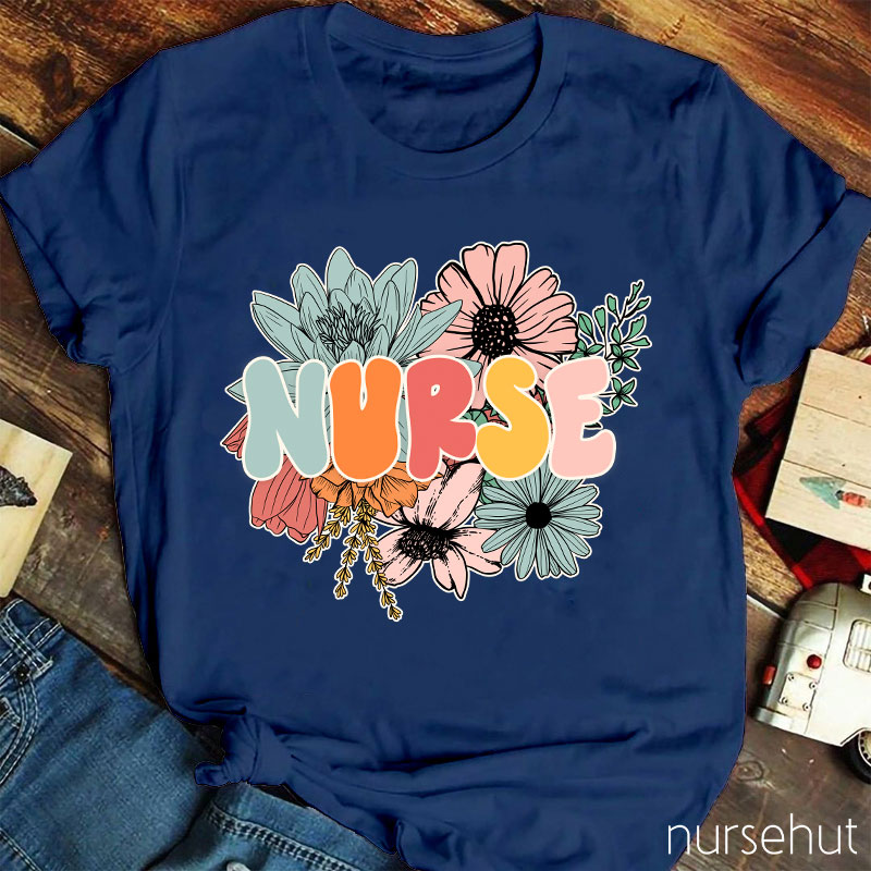 A Nurse Surrounded By Flowers Nurse T-Shirt