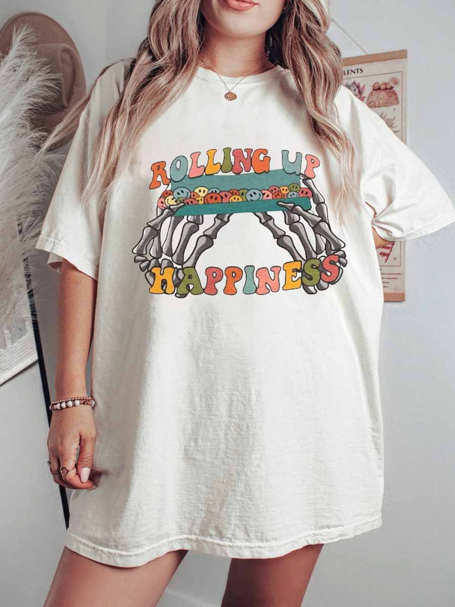 Rolling up Happiness skeleton hands tee