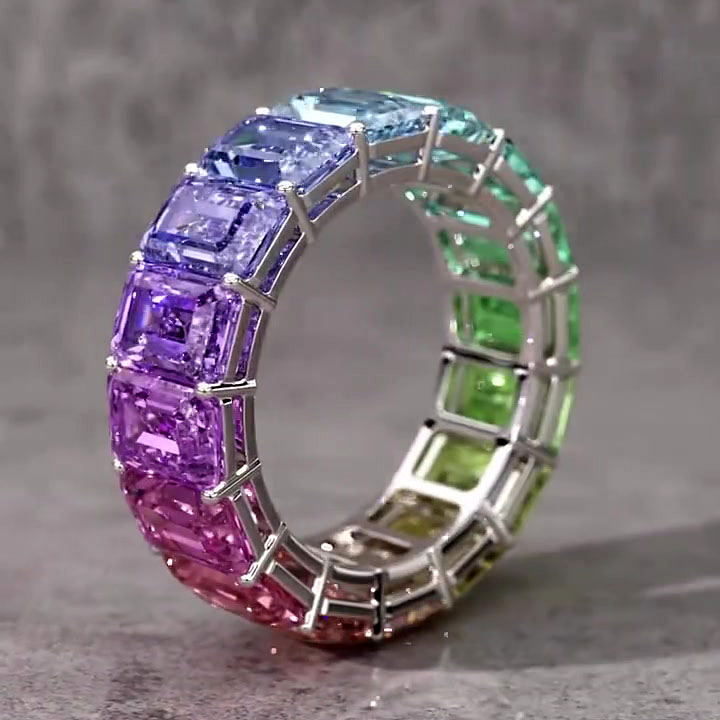 6.25ct Emerald Cut Rainbow Sapphire Eternity Ring