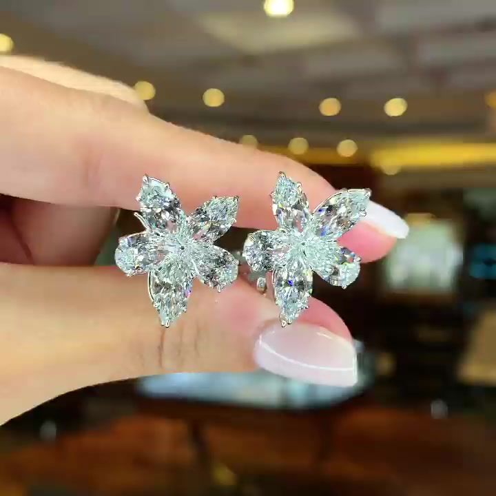 Pear Cut White Flower Sapphire Stud Earrings