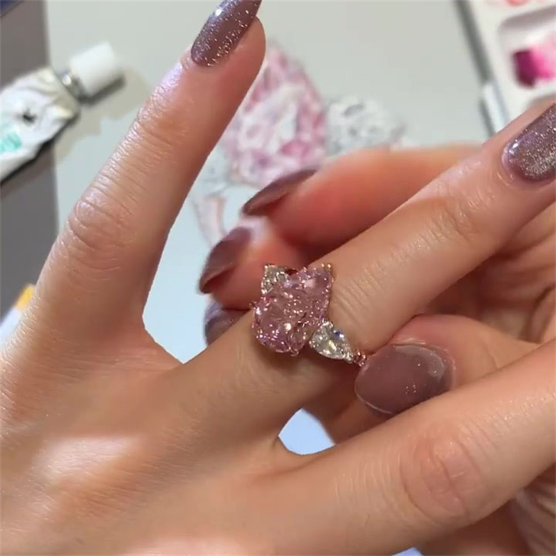 4.5 Carat Three Stone Rose Gold Pear Cut Pink Sapphire Engagement Ring