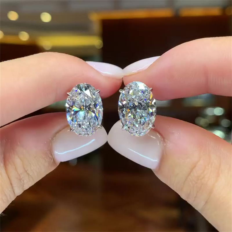 Oval Cut White Sapphire Stud Earrings