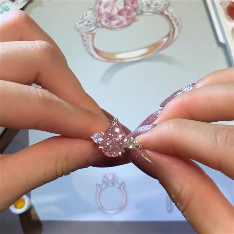 4.5 Carat Three Stone Rose Gold Pear Cut Pink Sapphire Engagement Ring
