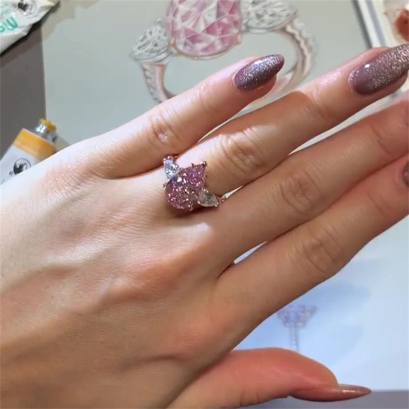 4.5 Carat Three Stone Rose Gold Pear Cut Pink Sapphire Engagement Ring
