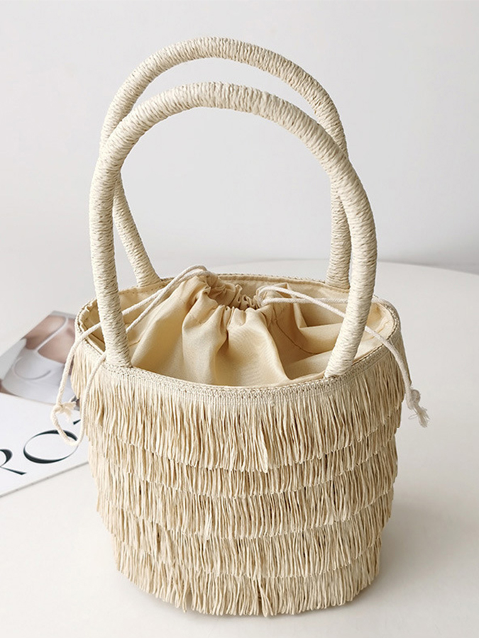 Simple casual holiday straw woven tassel beach handbag