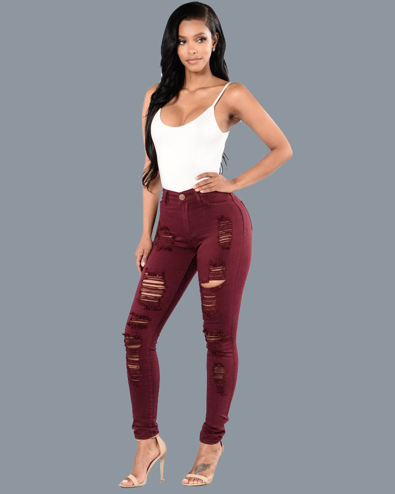 Vaqueros rasgados ajustados con realce de trasero para mujer