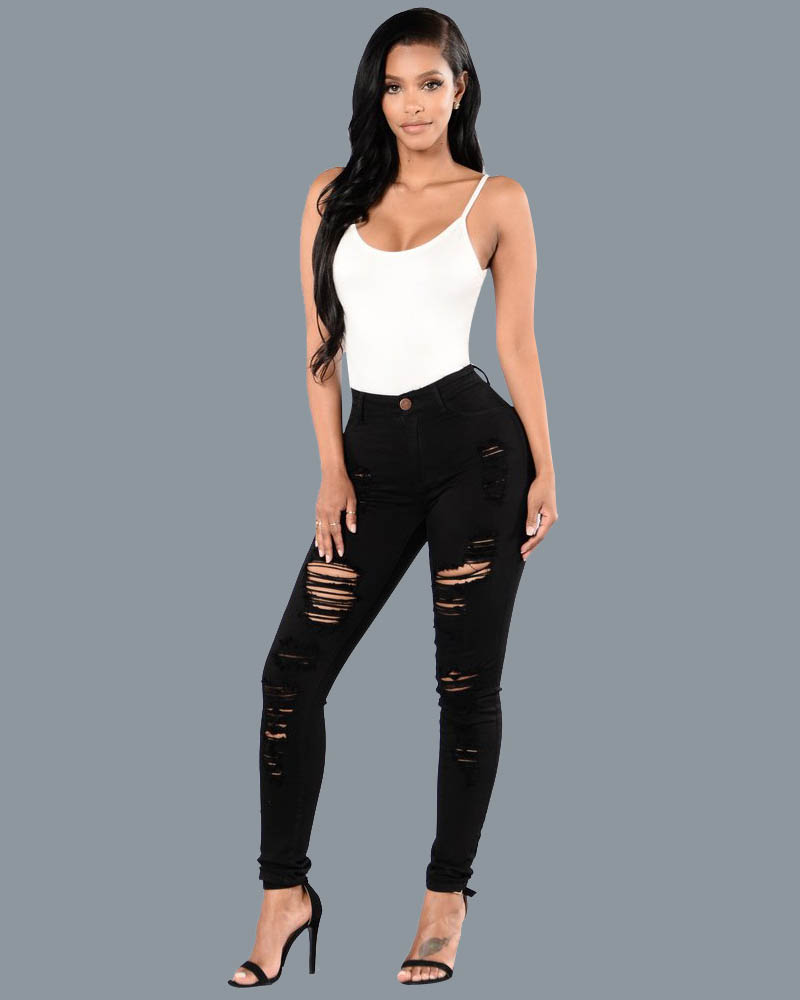 Vaqueros rasgados ajustados con realce de trasero para mujer