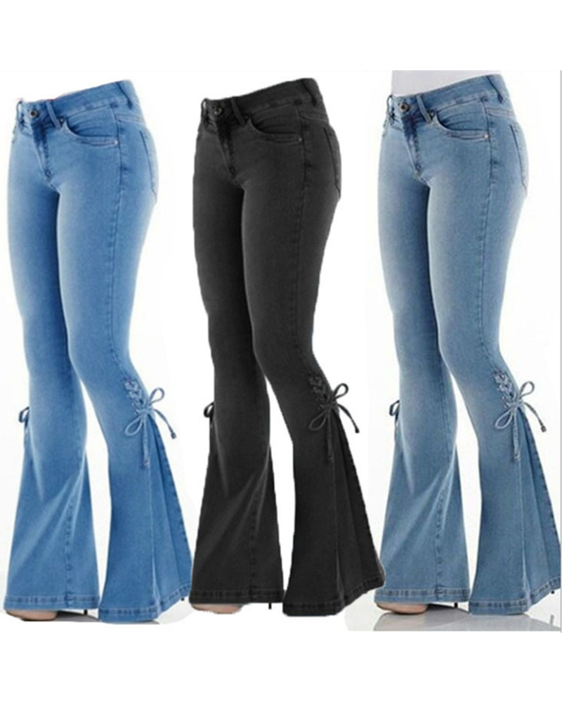 Pantalones de mezclilla de tiro medio con lazo jeans elásticos pantalo