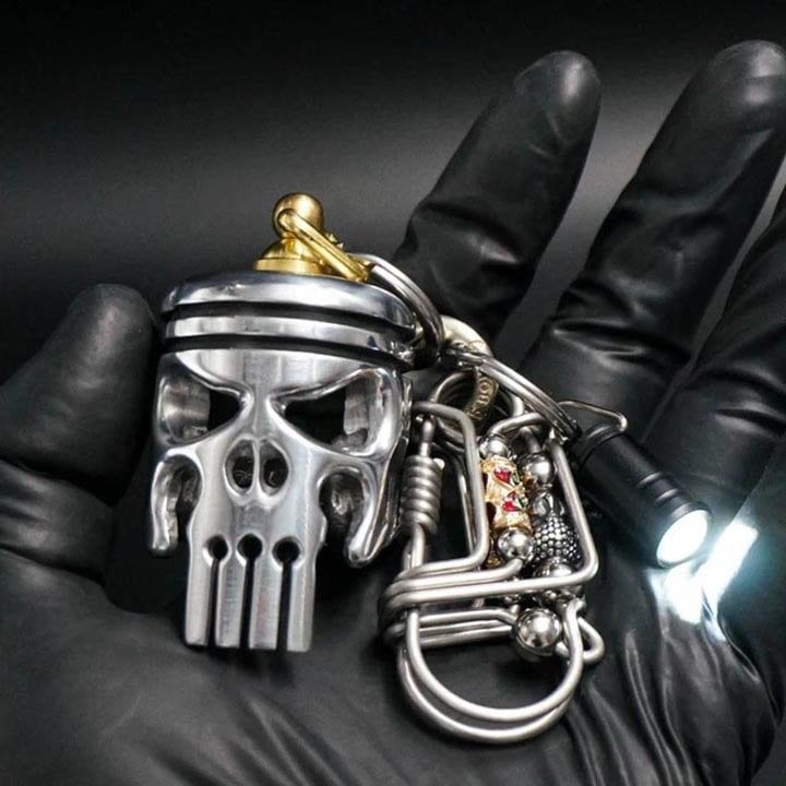Porte-clés Piston art tête de mort (pendentif/lampe de poche/ouvre-bou