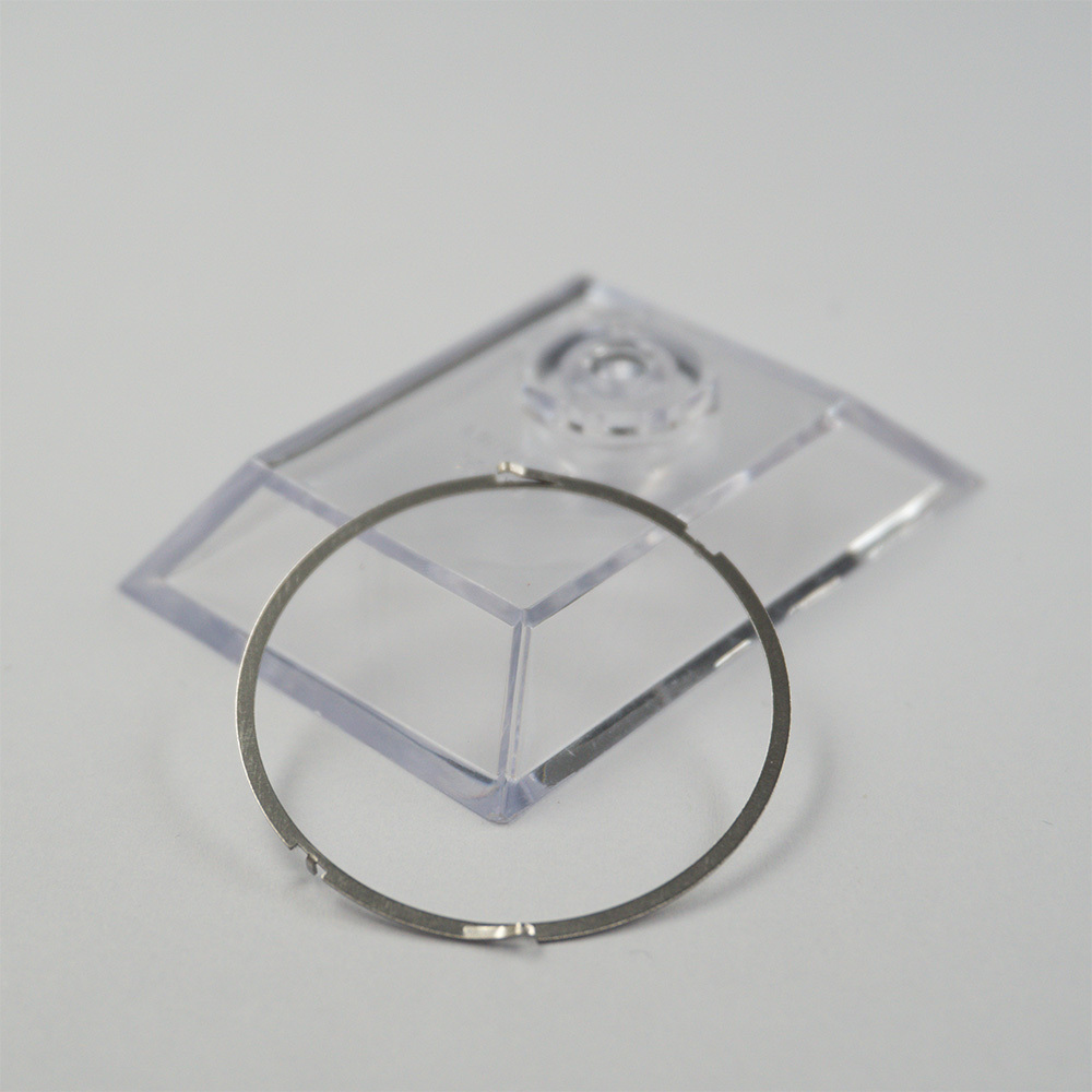 Bi-directional Bezel Click Spring