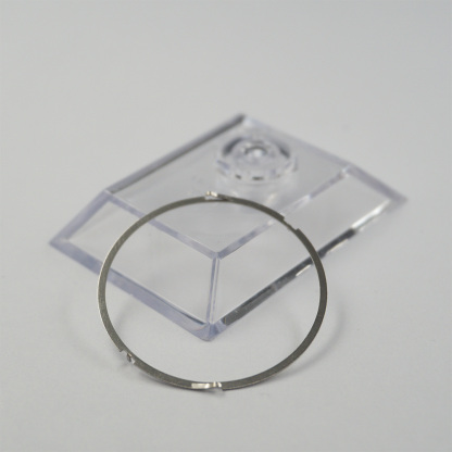 Bi-directional Bezel Click Spring