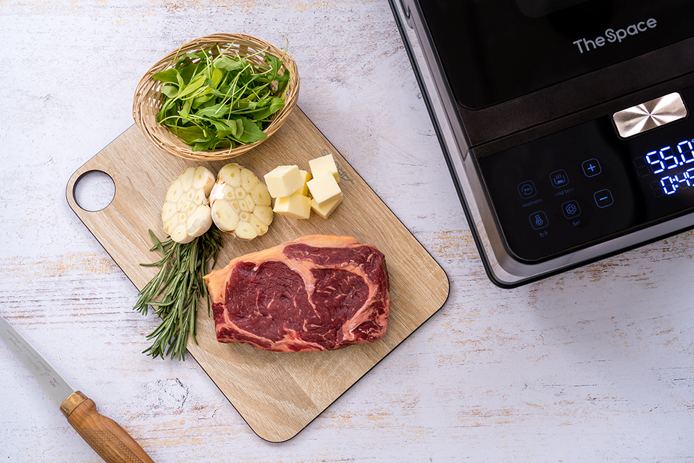 Sous Vide Ribeye Steak With GarlicRosemary Butter And Arugula Salad