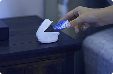 a person holding a white object