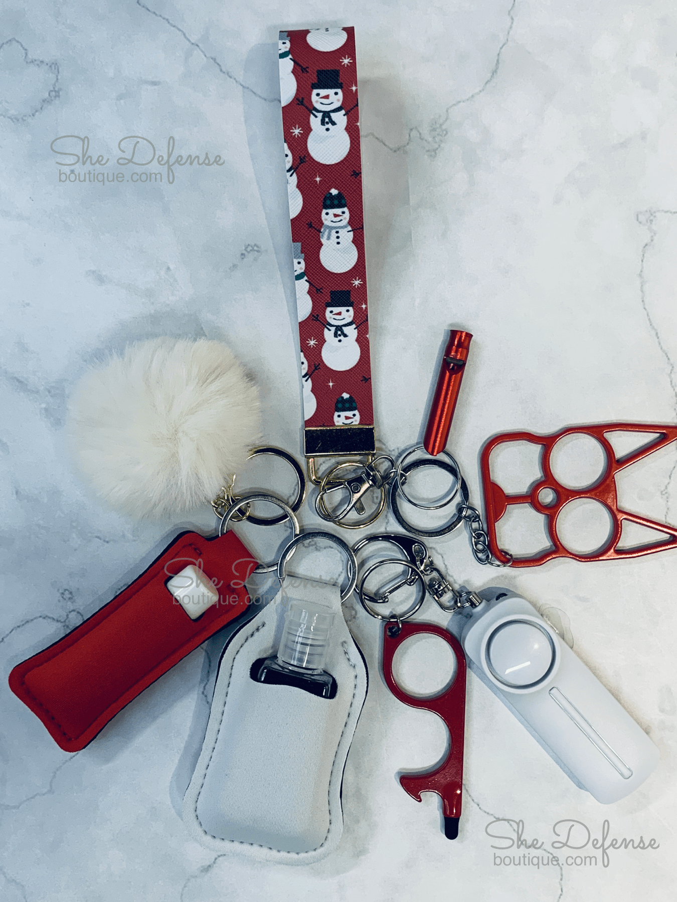 Snowman Red Background Faux Leather Self Defense Keychain Set