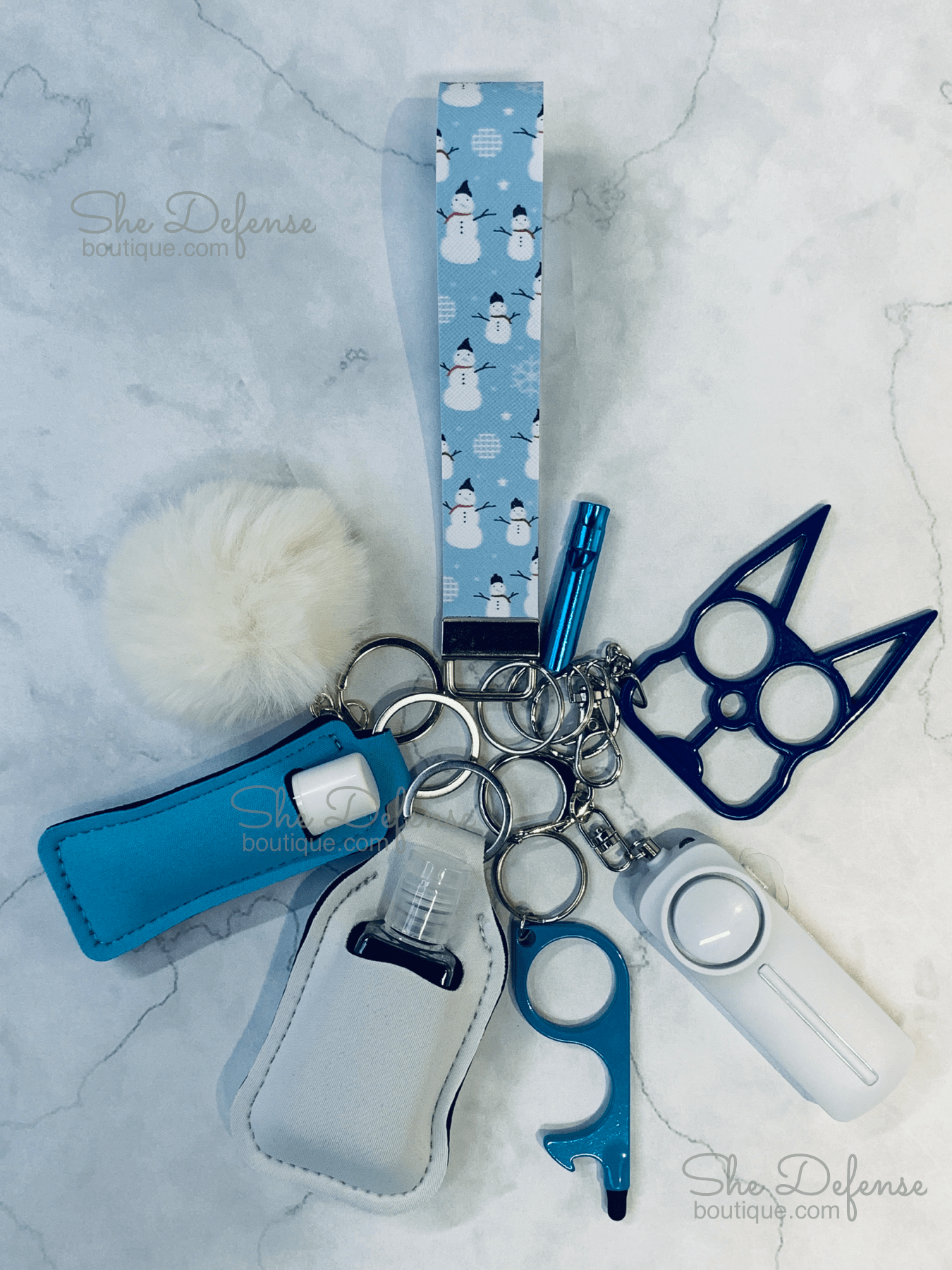 Snowman Blue Background Faux Leather Self Defense Keychain Set