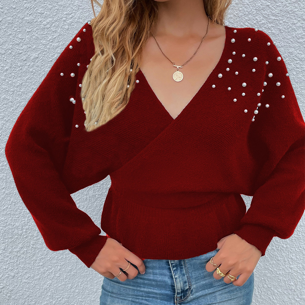 Sweter z dzianiny ze skrzyżowanym dekoltem w szpic i perłowymi rękawami