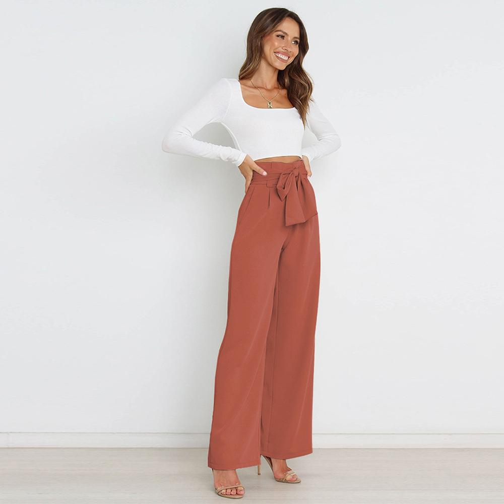 Damskie spodnie z szerokimi nogawkami i wiązaniem w talii