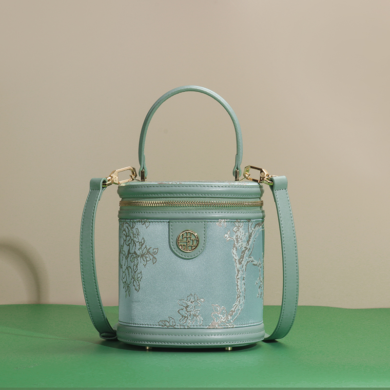 Chinese style leather embroidered bucket bag