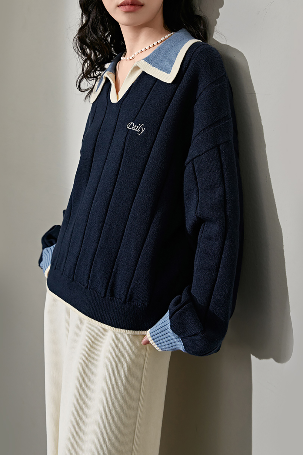 Navy blue vertical striped lapel sweater