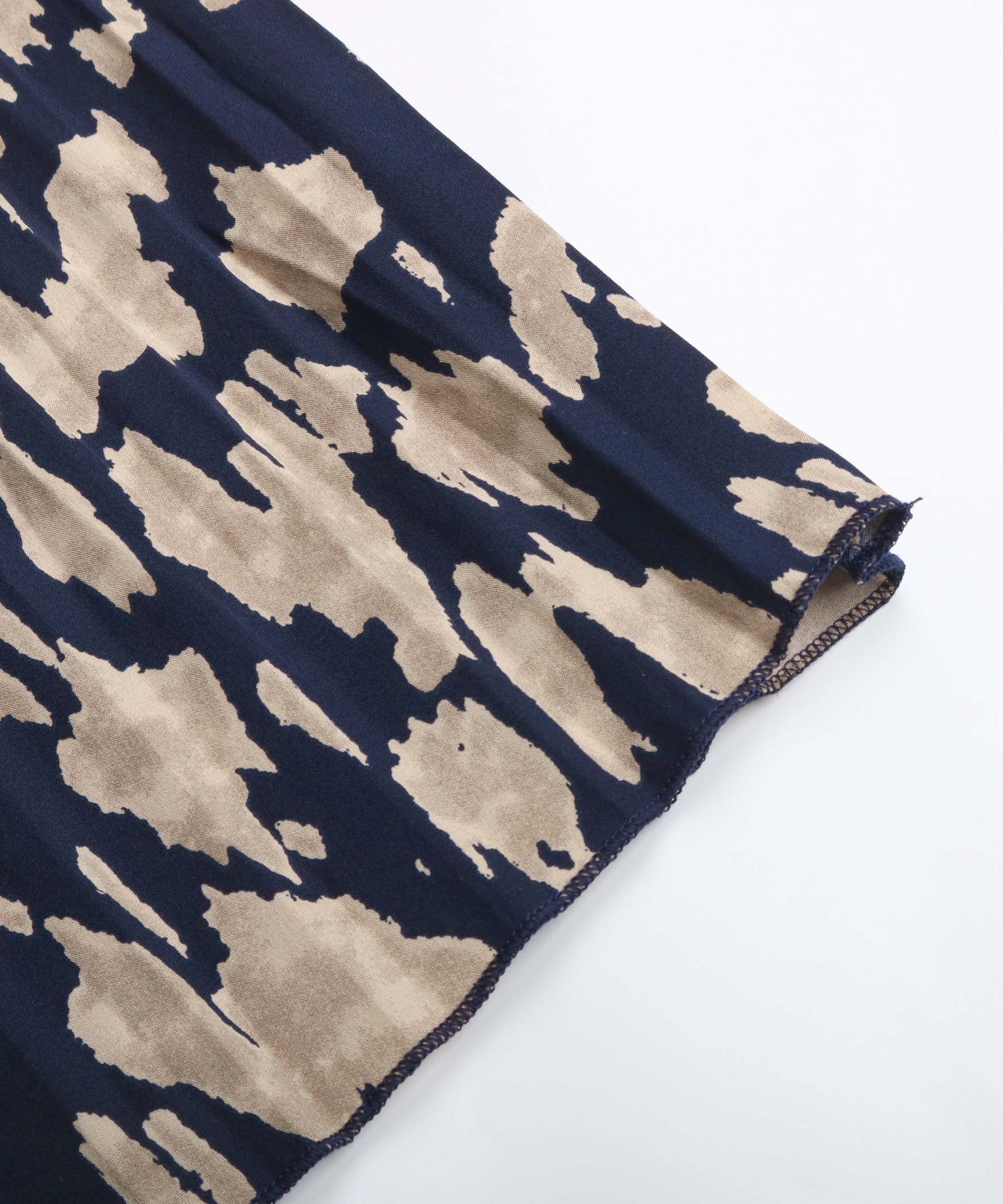 Allover Print Notched Neckline Pleated Hem Belted Midi Dress