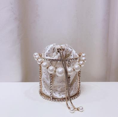 Luxury Diamond Metal Bucket Pearl Handle Women Party Clutch Purses and Handbags Hollow Designer Bag Wedding Chain Shoulder Bag