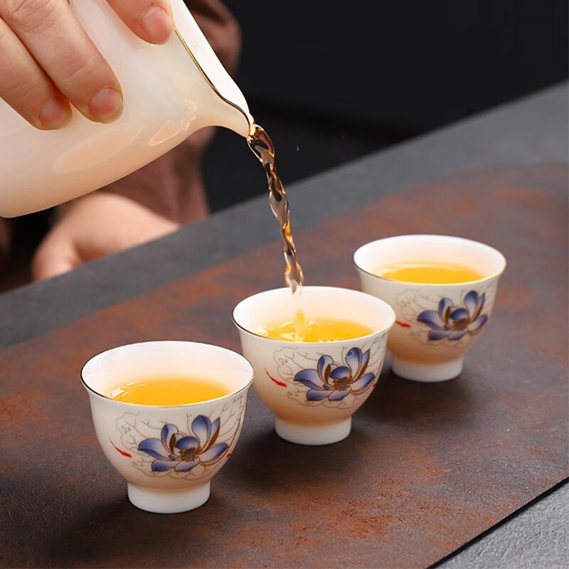 Sheep's fat porcelain kung fu tea set Hand-painted lotus pond moon cover bowl Pure white porcelain lotus pond moon tea set 14 heads