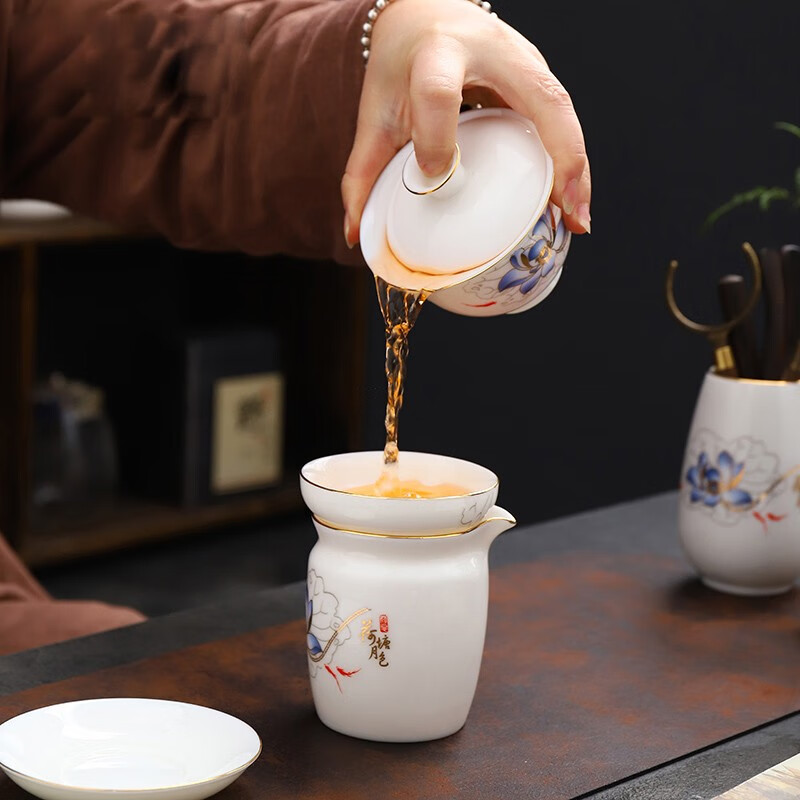 Sheep's fat porcelain kung fu tea set Hand-painted lotus pond moon cover bowl Pure white porcelain lotus pond moon tea set 14 heads