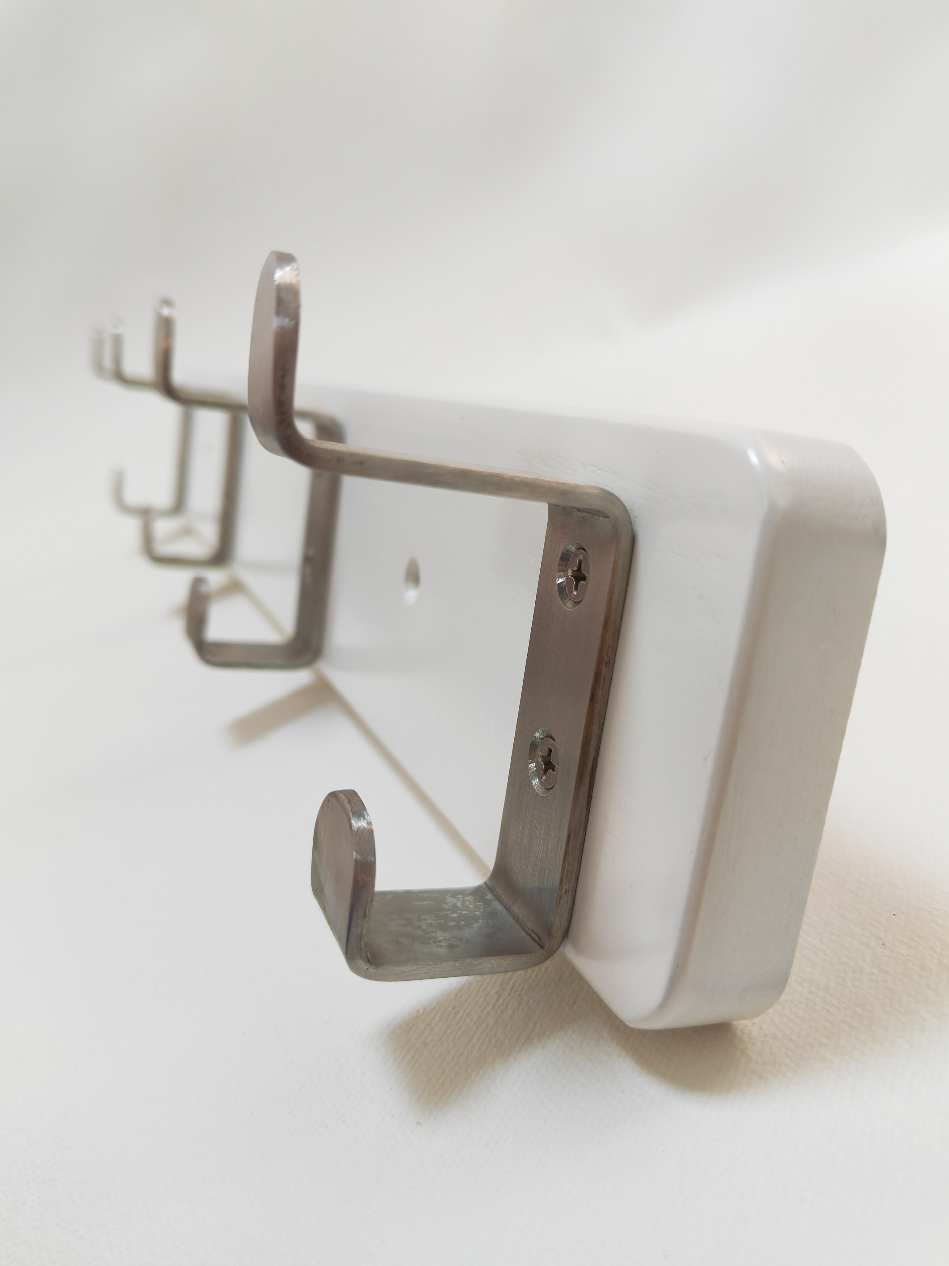 Four hooks up and down the MDF