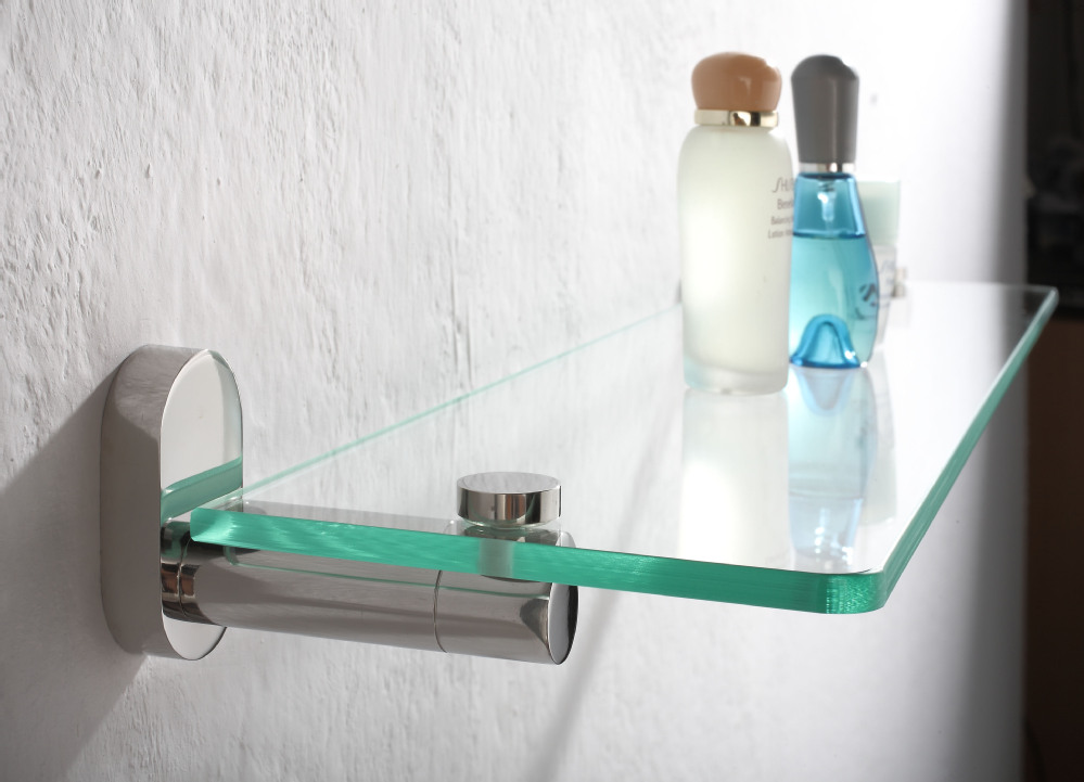 Glass shelf styled with bathroom accessories