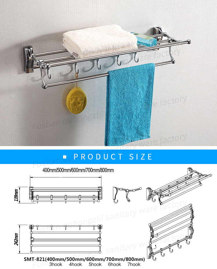 Expandable stainless steel towel rack with towels in bathroom