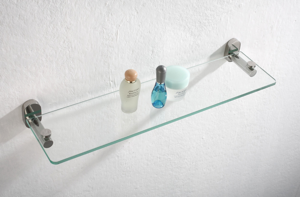 Side view of wall-mounted glass bathroom shelf