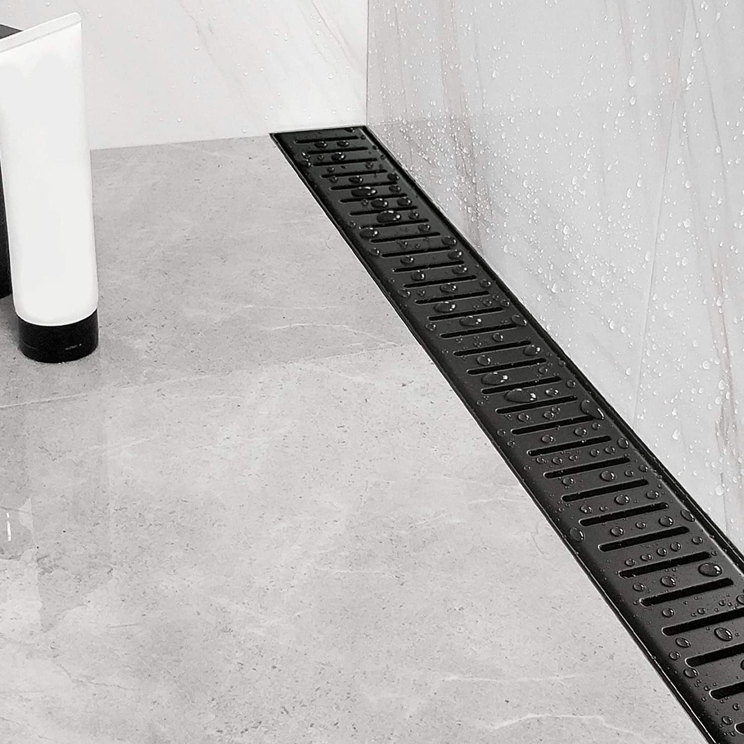Neodrain Black Linear Shower Drain with Capsule Pattern Grate Cover, 304 Stainless Steel Rectangle Shower Floor Drain, with leveling feet & strainer (Shiny Black)