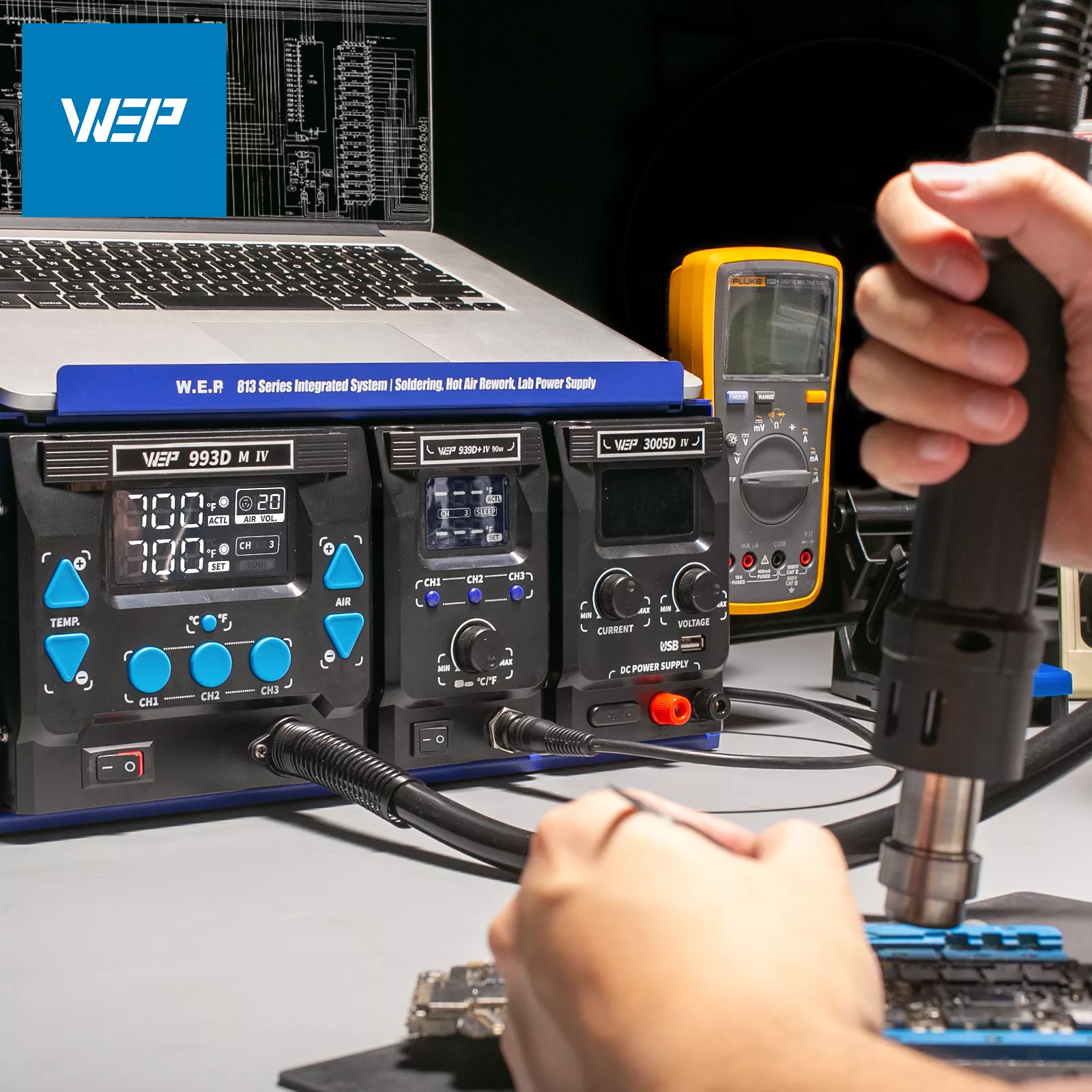Use the WEP hot air rework station in a electronic science lab to remove a chip